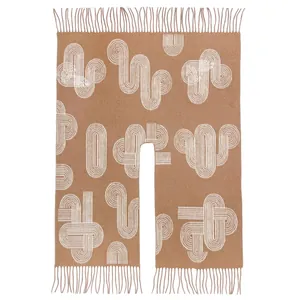 Ethnic camel knit shawl wrap with white spiral patterns and long tassel fringe detailing