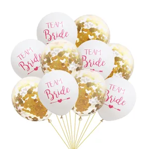 Detail of Team Bride white latex balloons and transparent balloons with gold confetti