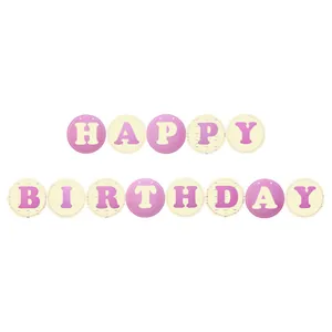 Detail of pink and yellow Happy Birthday round paper bunting flags for party decoration