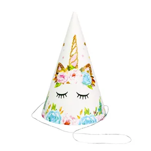 Sparkly unicorn party hat with golden horn and colorful floral decorations on white base