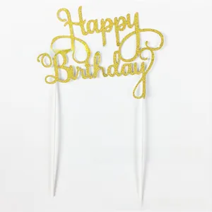 Close-up of golden glitter Happy Birthday cake topper with dual support sticks for parties
