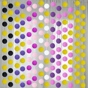 Close-up of glitter gold and pink circle paper garland for birthday party decoration