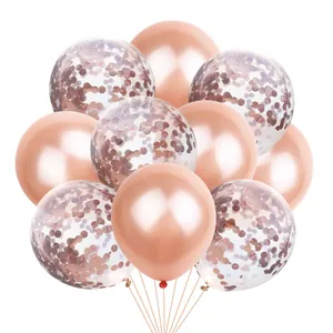 Close-up of rose gold metallic balloons and clear confetti balloons for party decor
