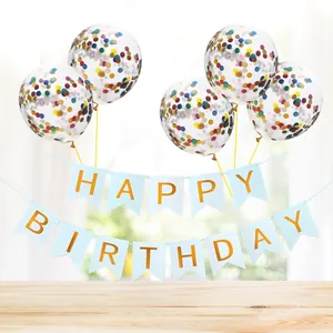 Close-up of blue Happy Birthday banner and five clear confetti balloons for party decor