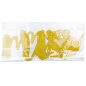 Close-up of glittery gold Mr & Mrs wedding banner set in clear retail packaging