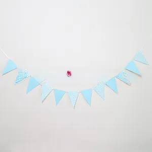 Close-up of blue and white chevron pattern bunting flags for party wall decoration