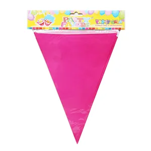 Pink triangular party banner in plastic packaging with decorative yellow hanging card