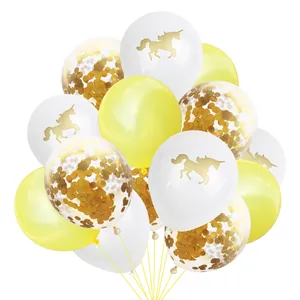 Close-up of rose gold confetti balloons and unicorn silhouette party decorations