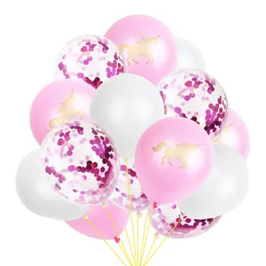 Detail of rose gold confetti and unicorn print balloons for party decorations