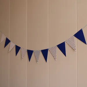 Detail of navy blue and chevron patterned triangular bunting banner for party decor