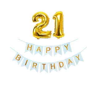 Detail of gold 21 number foil balloons with blue Happy Birthday banner set