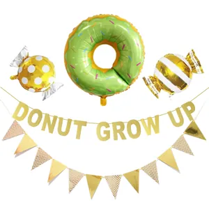 Detail of Donut Grow Up glitter banner and candy foil balloons for fiesta party decorations