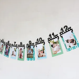 Baby's 1st birthday photo banner with numbered mint green and polka dot frames