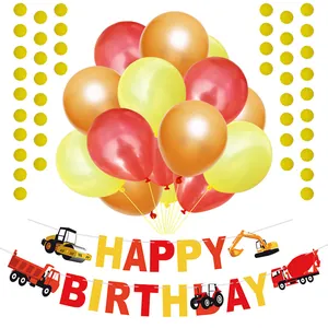 Detail of construction vehicle birthday banner with glitter dots and colorful balloons