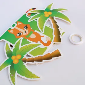 Close-up of jungle animal party banners featuring cartoon lion and elephant cutouts