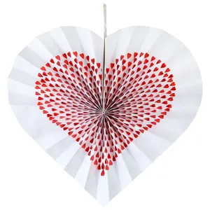 Hanging heart-shaped paper fan with red heart patterns for wedding and party decorations