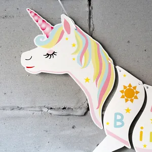 Unicorn Happy Birthday banner with pastel unicorn icons and letter flags for party decor