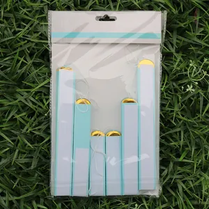 Light blue paper hanging decoration set with gold foil accents in retail packaging
