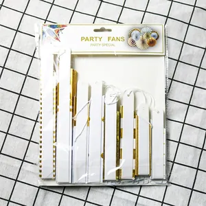 Gold foil paper fan set for party decoration featuring elegant stripes and polka dots