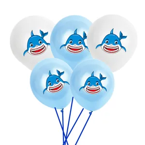 Detail of 12-inch latex balloons with cute blue cartoon shark prints for party decor