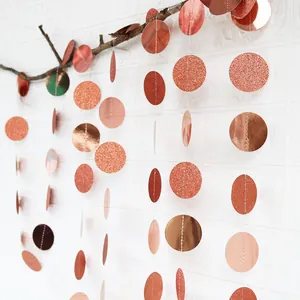 Rose gold circle garland featuring glitter and mirror finish paper dots for party decor