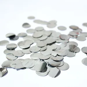 Shiny silver round confetti sequins for balloon filling and party decoration on white background