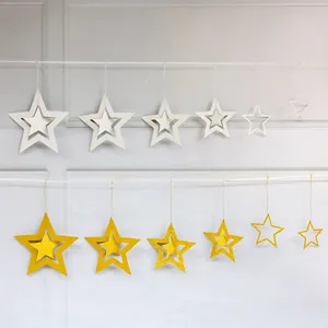 Detailed set of gold and silver hollow star ornaments with glitter finish in multiple sizes