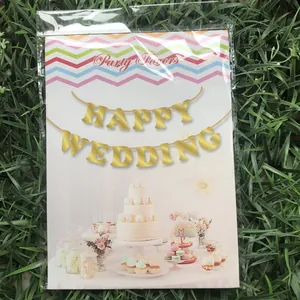 Golden Happy Wedding banner set in retail packaging for bridal party background decor