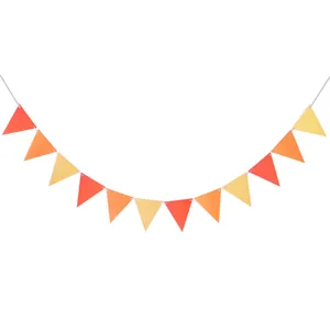 Detail of red orange and yellow triangle bunting garland for birthday party decorations