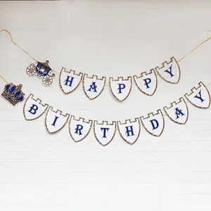 Detail of Royal Prince birthday banner with Happy Birthday shield cards and gold accents