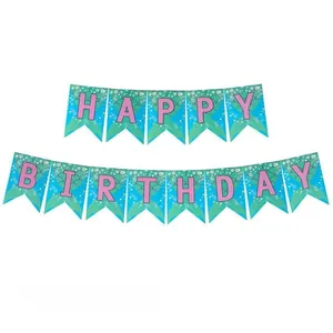 Detail view of pink mermaid fishtail Happy Birthday banner with golden letters