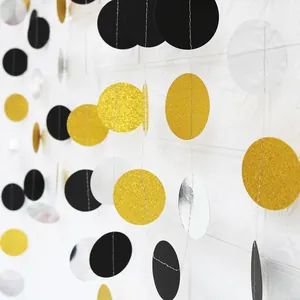 Close-up of 4m gold glitter and black paper circle garland for party wall decoration