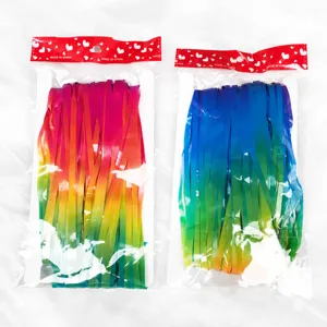 Detail view of colorful gradient foil fringe curtains in clear retail packaging