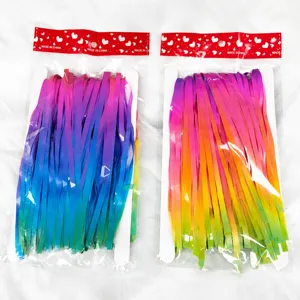 Detail view of colorful gradient foil fringe curtains in individual polybag packaging