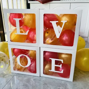 Διαφανή κουτιά μπαλονιών LOVE με κόκκινα και χρυσά μπαλόνια για διακόσμηση πάρτι