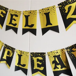 Detail of Feliz Cumpleaños banner with gold mirror letters on black cardstock