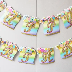 Princess castle banner with gold glitter letters and floral rainbow party decorations