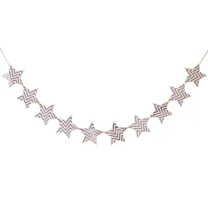Close-up of rose gold chevron star banner for outdoor party and tent decoration