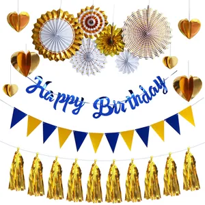 Navy blue and gold birthday party decoration set with banners, paper fans, and tassels