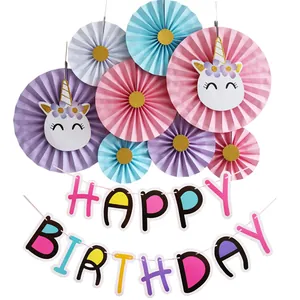 Pink and pastel unicorn themed birthday decoration set with paper fans and banner