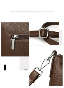 Detail of silver-toned hardware and lychee pattern leather texture on a brown handbag