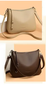 Detailed comparison of beige and brown lychee grain leather shoulder bags with gold hardware