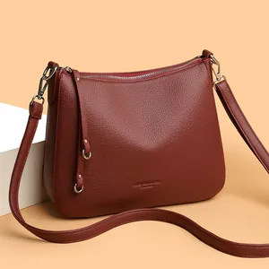 Litchi pattern leather shoulder bag for women in burgundy red with silver hardware