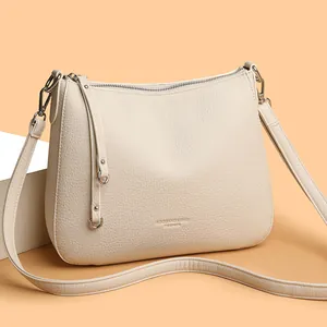 Minimalist beige lychee texture shoulder bag for women with large capacity and stylish crossbody strap