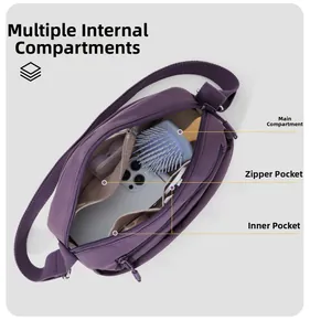 Innenansicht der lila Nylontasche mit organisierten Fächern und Reißverschluss für Damen