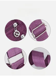 Detail view of purple nylon bag with adjustable metal buckle and smooth branded zippers