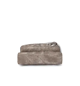 Detail view of the rectangular base and stitching of the retro taupe crossbody bag