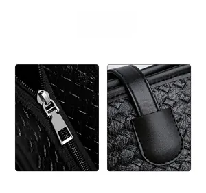 Detail of black woven texture and high-quality silver metal zipper on tote bag