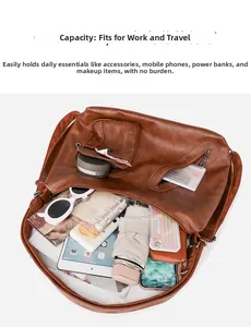 Brown leather tote bag interior view showing large capacity for tablet and essentials
