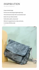 Detail view of large grey PU shoulder bag featuring a geometric pattern woven strap
